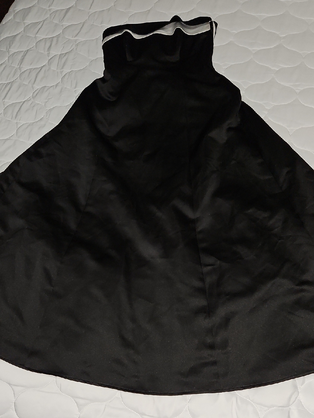 Classic Black Strapless Fit-and-Flare Dress with White Accent.  Dress has Lining